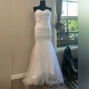 - White mermaid, form fitting, wedding dress